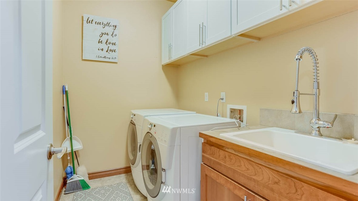 21131 37th Avenue Southeast Bothell, WA 98021 - Photo 14 of 40 a utility room with dryer and washer