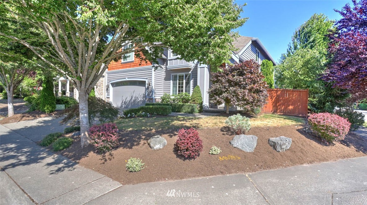 21131 37th Avenue Southeast Bothell, WA 98021 - Photo 3 of 40 a view of a house with yard and garden