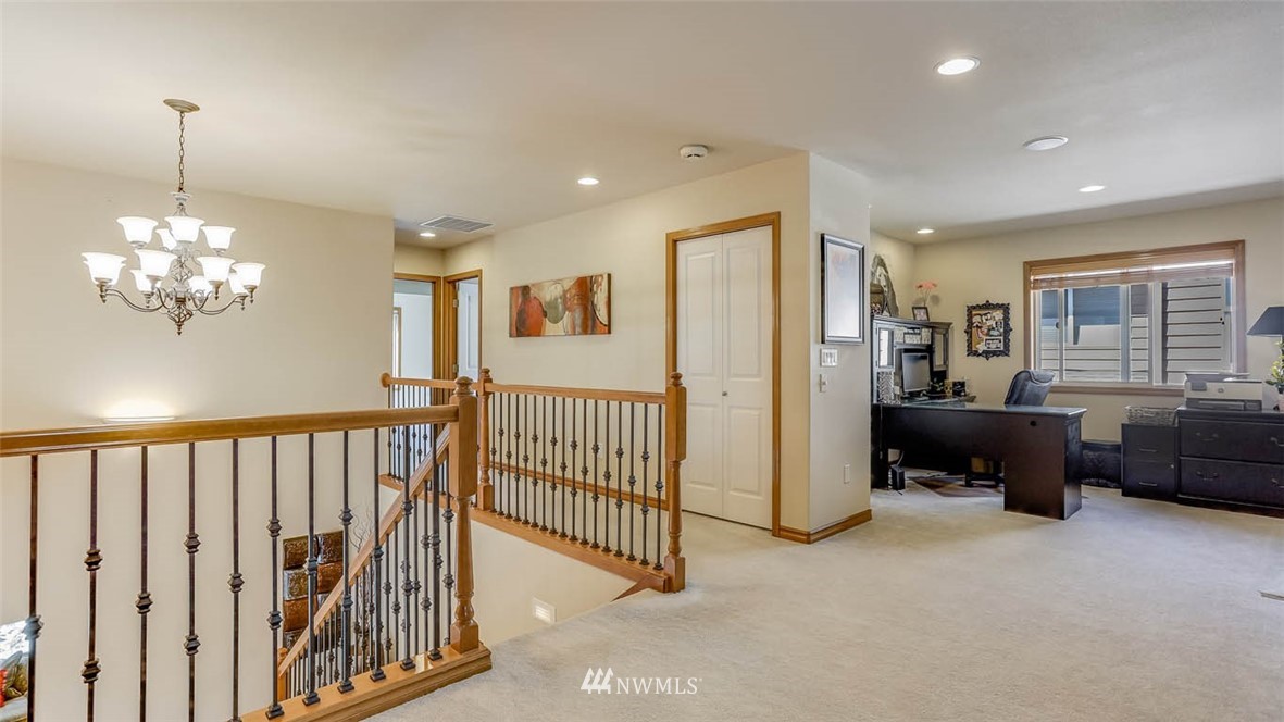 21131 37th Avenue Southeast Bothell, WA 98021 - Photo 23 of 40 a view of a livingroom with furniture and windows