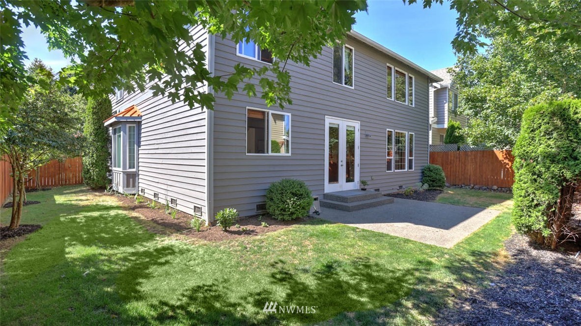 21131 37th Avenue Southeast Bothell, WA 98021 - Photo 38 of 40 a view of a house with a yard