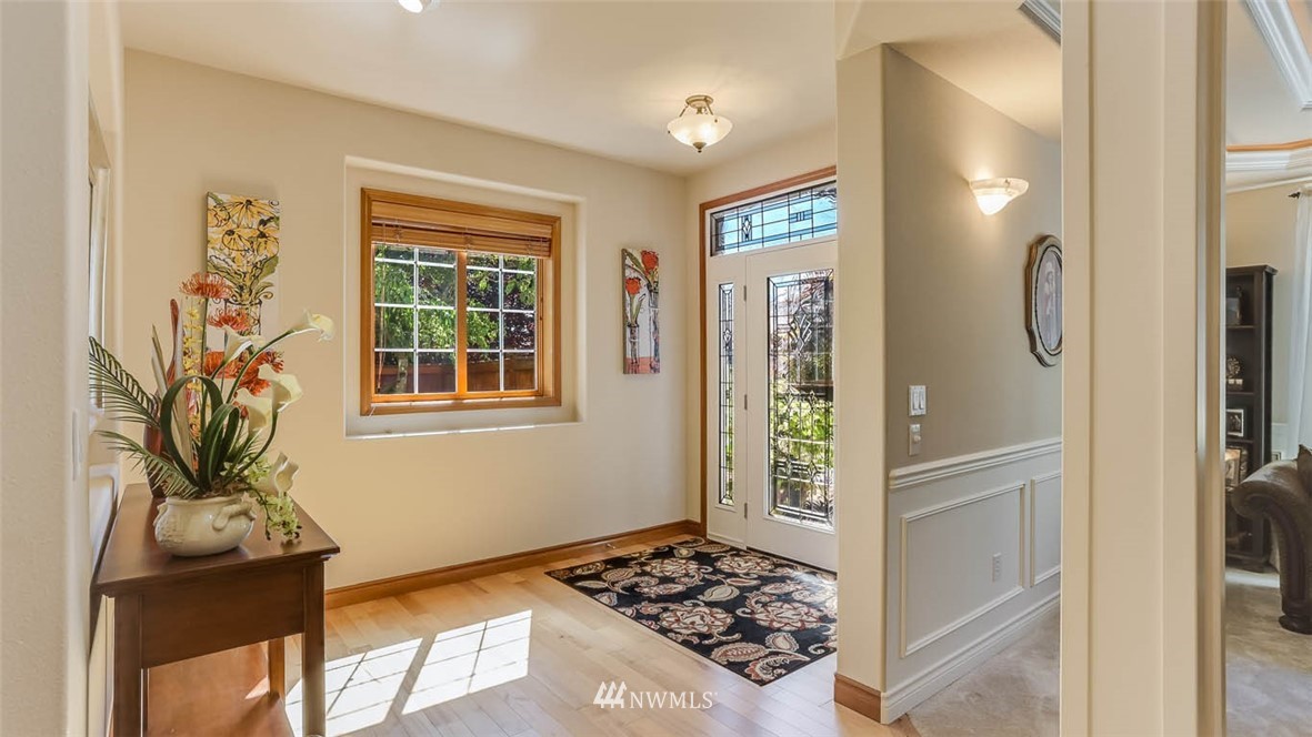 21131 37th Avenue Southeast Bothell, WA 98021 - Photo 7 of 40 a bedroom with a bed and a window