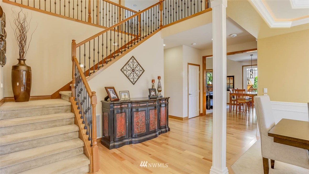 21131 37th Avenue Southeast Bothell, WA 98021 - Photo 9 of 40 a view of entryway and hall with wooden floor