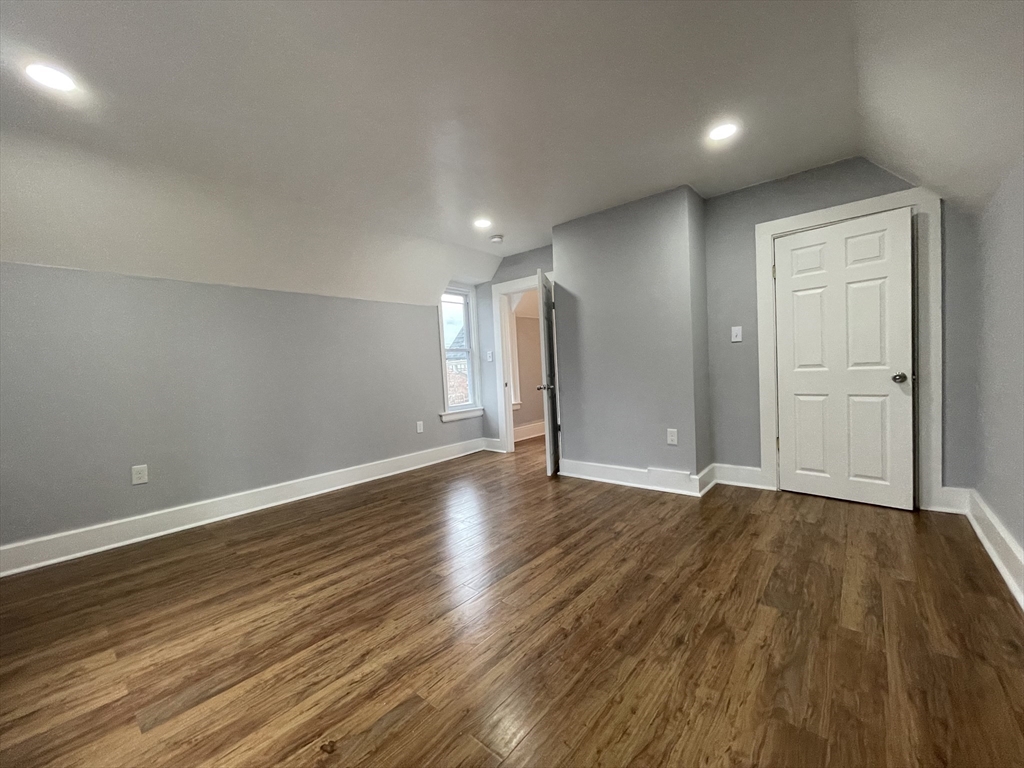 59 High Street Warren, MA 01083 - Photo 21 of 42 a view of an empty room with wooden floor