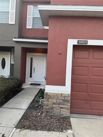 a stone house with a door
