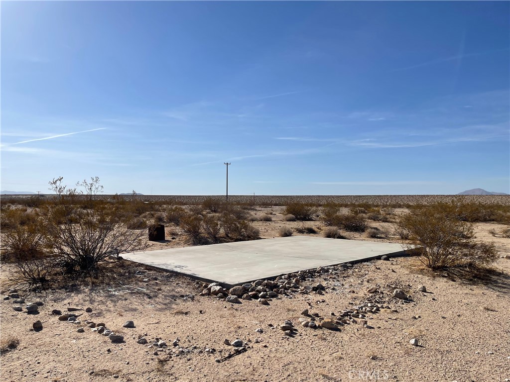 0 Cascade Road Joshua Tree, CA 92252 - Photo 9 of 11 a view of a beach and a yard