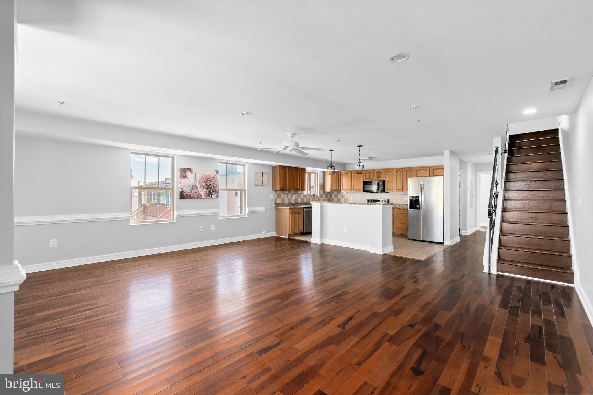 1829 Providence Street Northeast, Unit A Washington, DC 20002 - Photo 11 of 38 a view of a kitchen with wooden floor