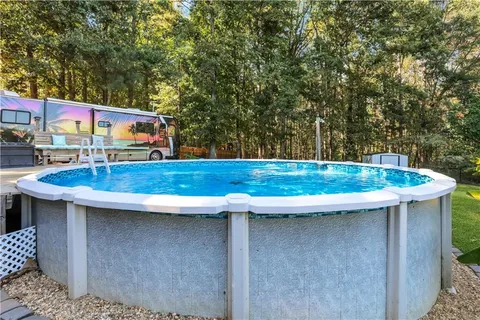 a view of outdoor space with swimming pool