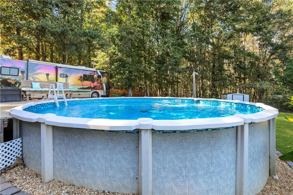 2760 Jona Trail Dacula, GA 30019 - Photo 34 of 40 a view of outdoor space with swimming pool