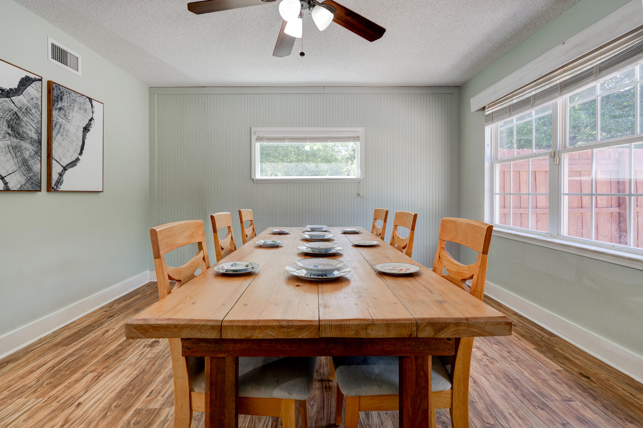 4236 Edge Perry Road Crestview, FL 32539 - Photo 12 of 51 a view of a dining room with furniture window and wooden floor