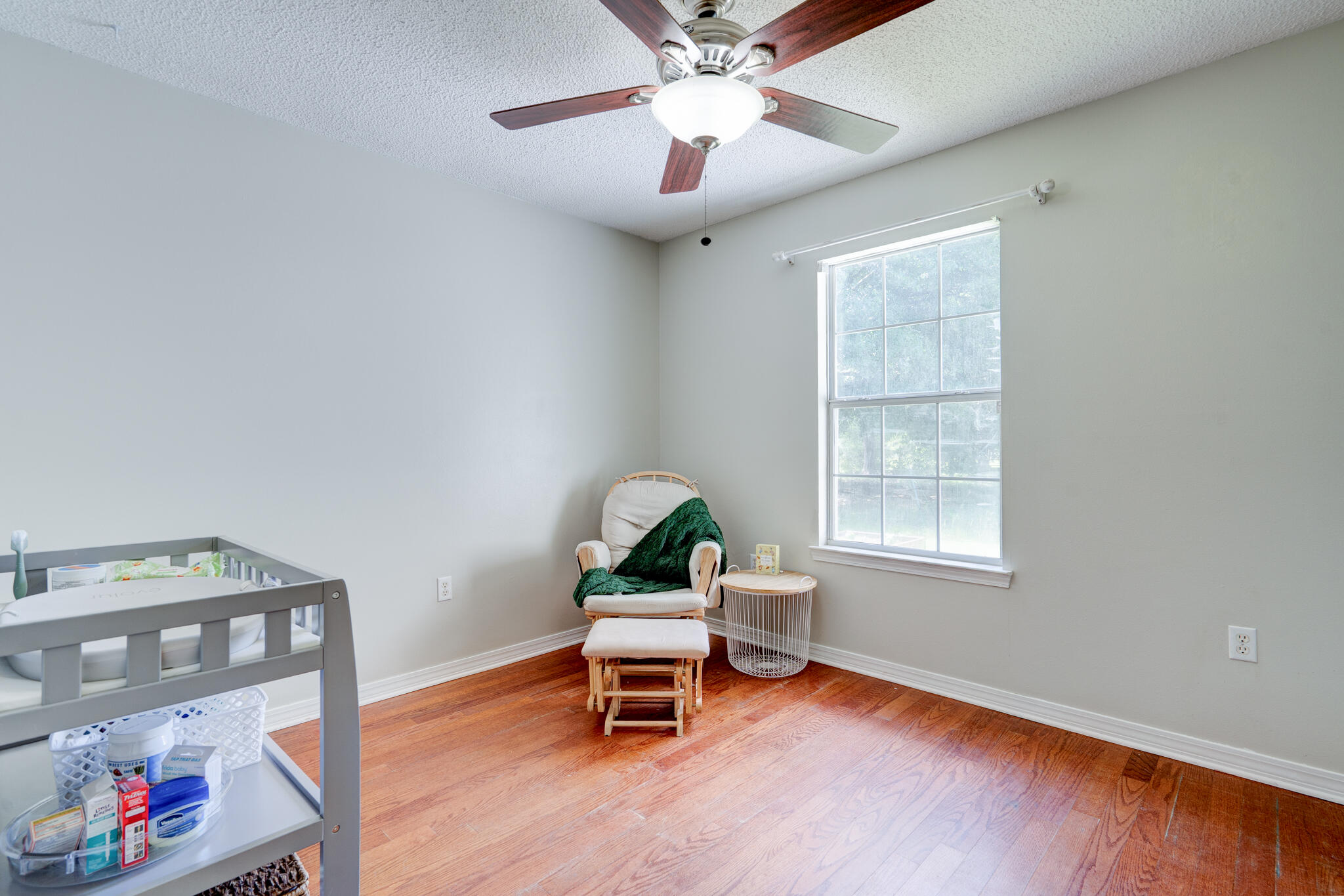 4236 Edge Perry Road Crestview, FL 32539 - Photo 17 of 51 a living room with furniture and a window
