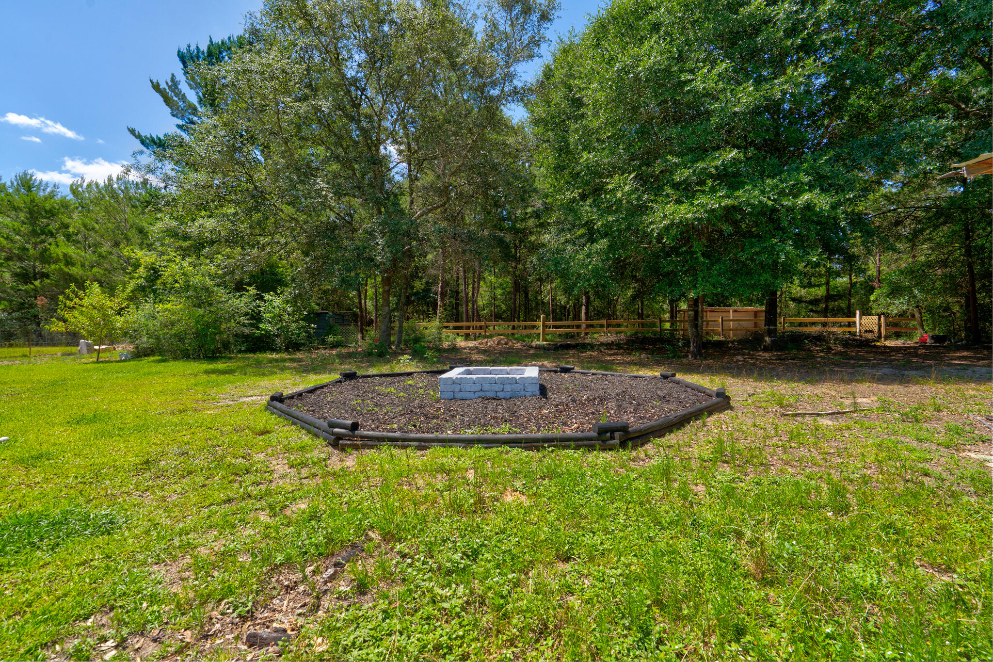 4236 Edge Perry Road Crestview, FL 32539 - Photo 27 of 51 a view of a swimming pool with a yard