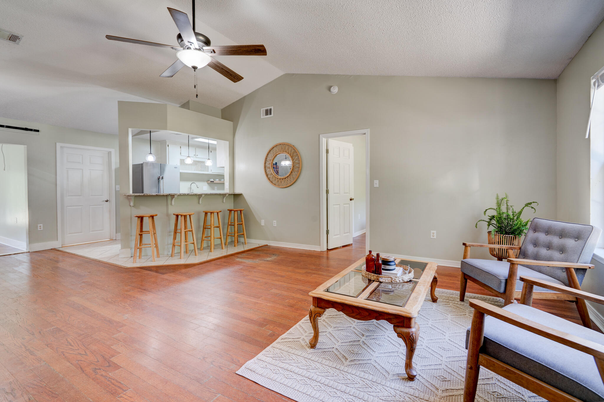 4236 Edge Perry Road Crestview, FL 32539 - Photo 3 of 51 a living room with furniture and wooden floor