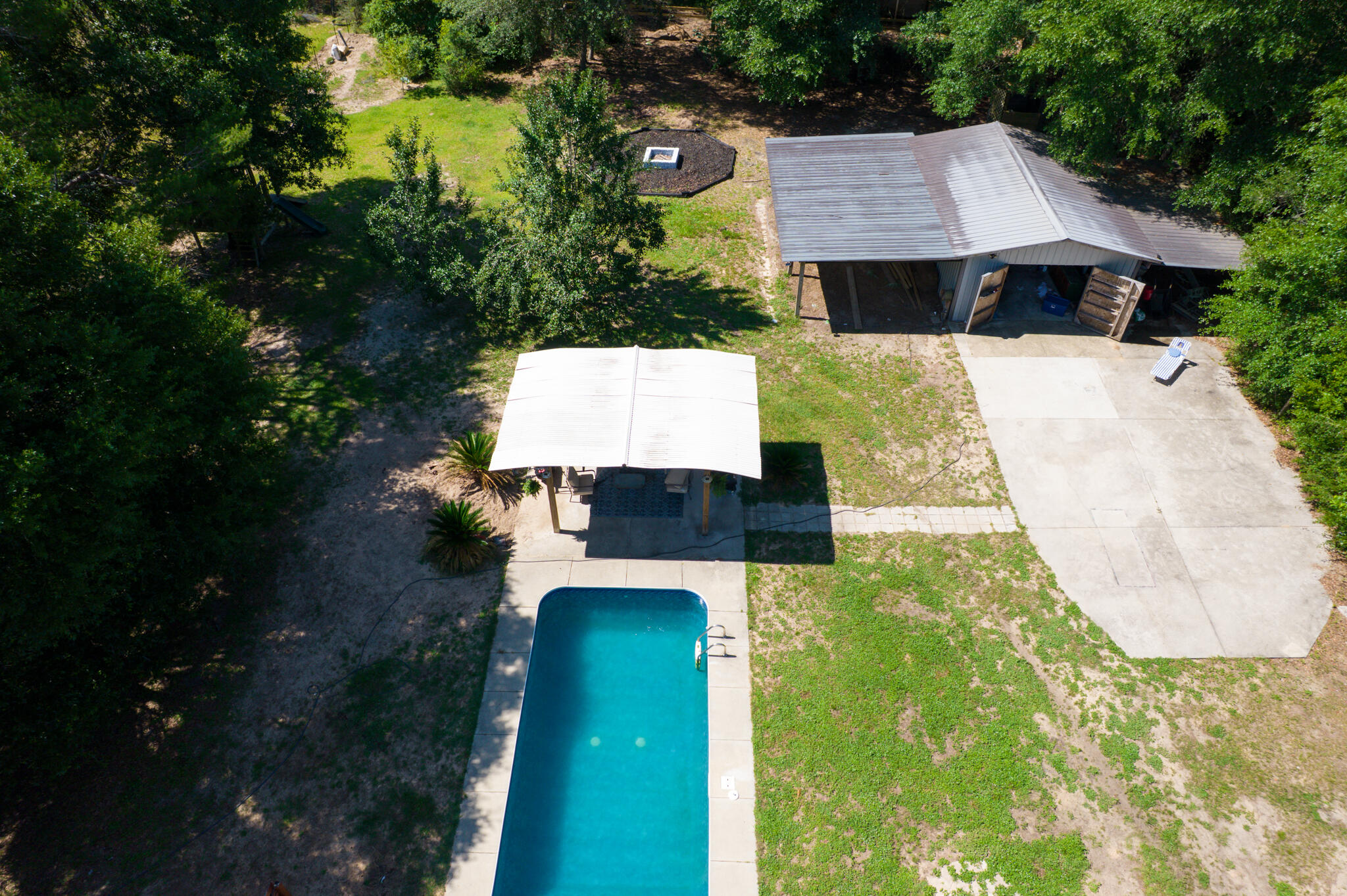 4236 Edge Perry Road Crestview, FL 32539 - Photo 42 of 51 an aerial view of a house with swimming pool garden and patio