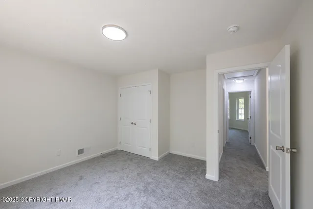 a view of a wooden roof deck