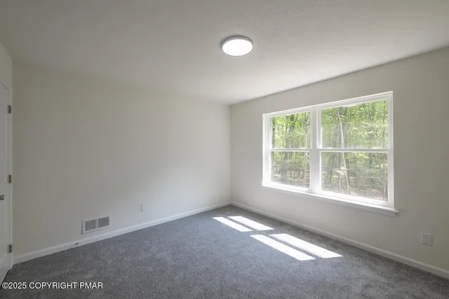 a view of a patio on the roof deck