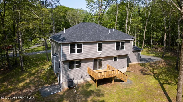 a house with trees in front of it