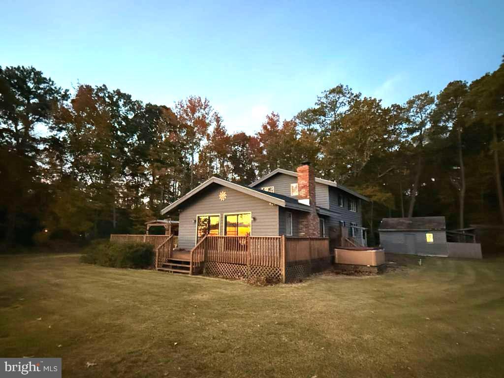 310 Brush Neck Road Susan, VA 23163 - Photo 31 of 70 a front view of a house with a yard and garage