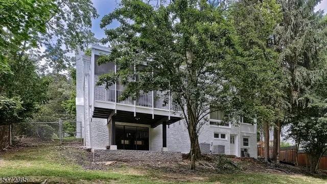 a view of house with yard