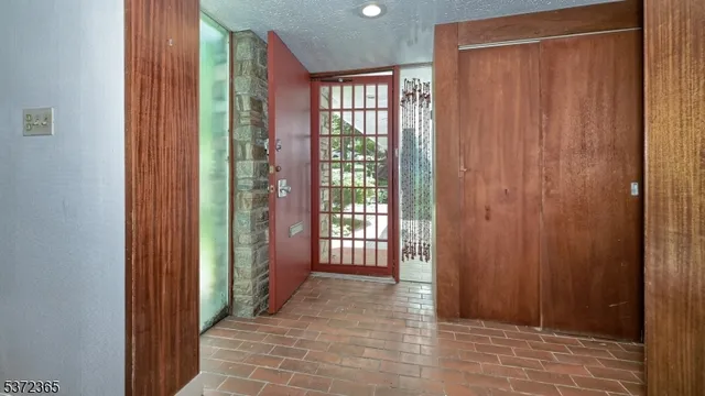 a view of hallway with windows