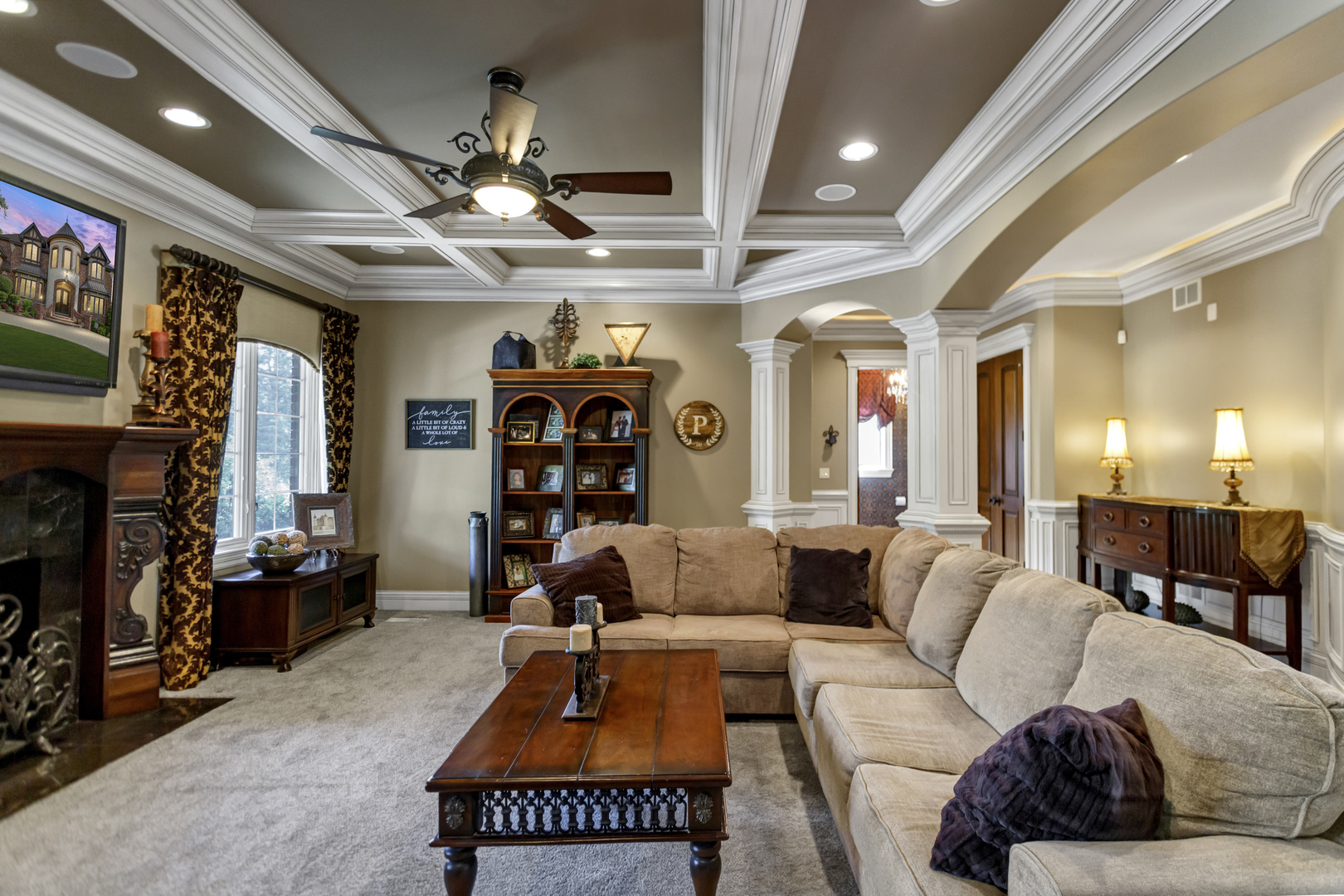 400 West Maple Avenue Roselle, IL 60172 - Photo 27 of 91 a living room with furniture a fireplace and a chandelier