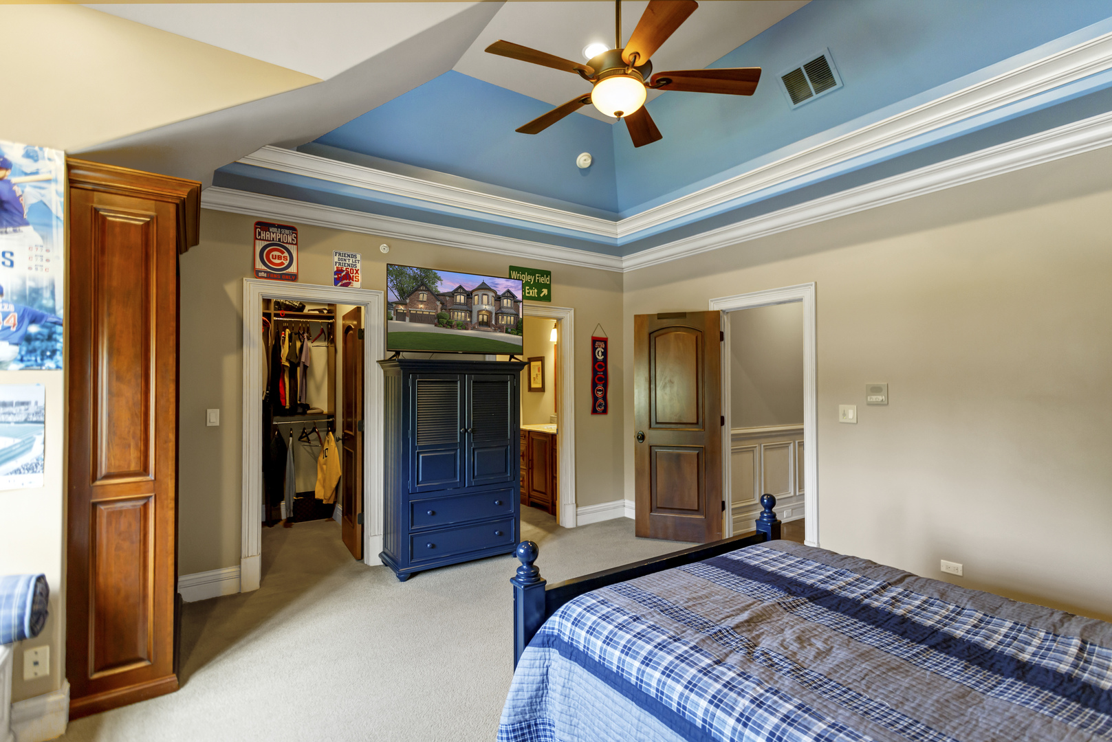 400 West Maple Avenue Roselle, IL 60172 - Photo 50 of 91 a bedroom with a bed and a chandelier