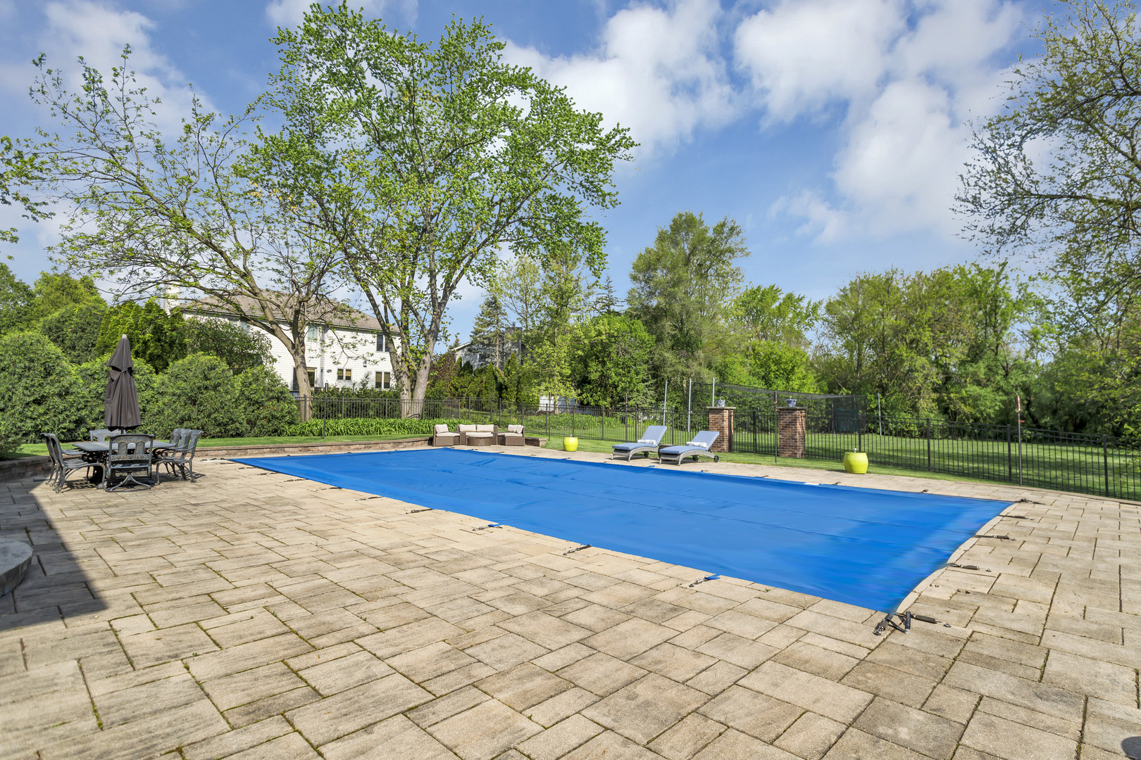 400 West Maple Avenue Roselle, IL 60172 - Photo 79 of 91 a view of swimming pool with an outdoor space and seating area