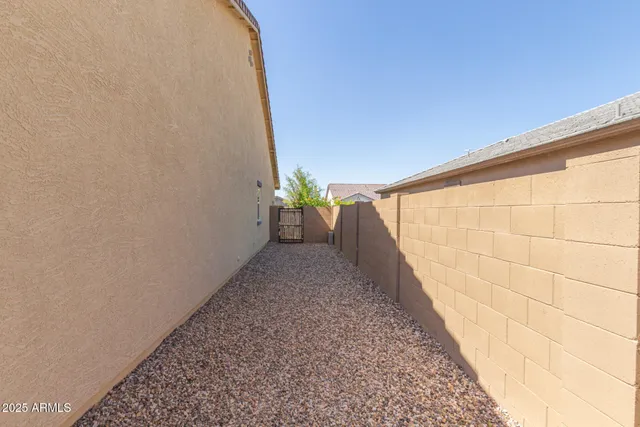 a view of a backyard of the house