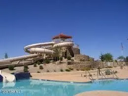 a view of park with tall buildings