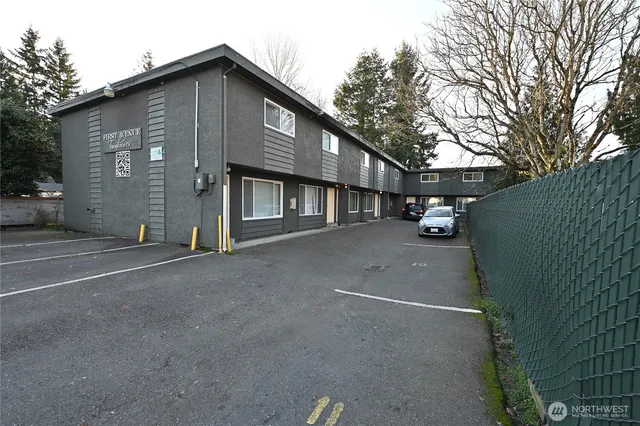 a view of a house with a street