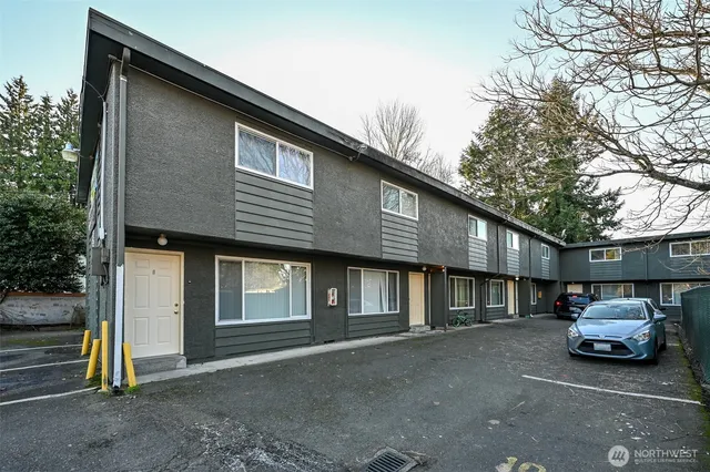 a car parked in front of a house