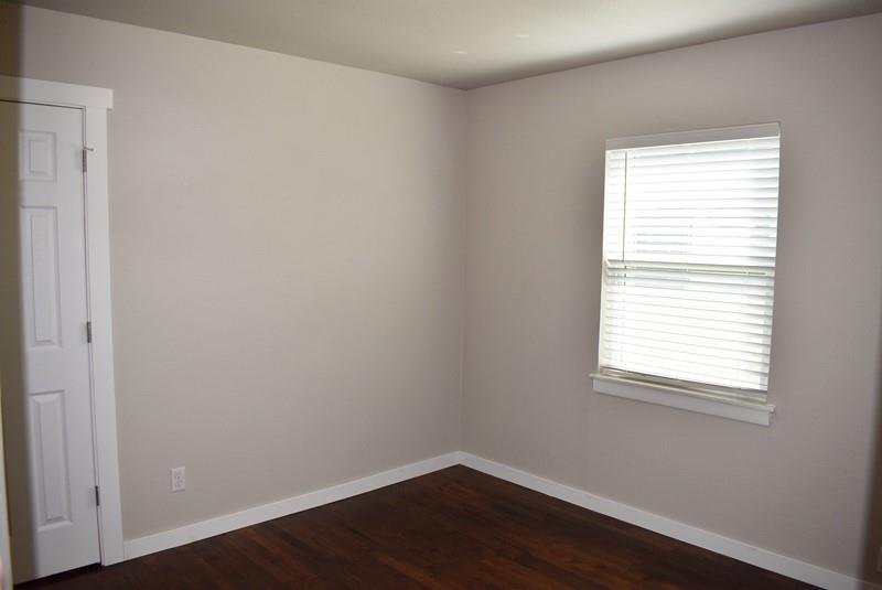 541 South Allen Street, Unit A Boyd, TX 76023 - Photo 12 of 15 a view of a small space with wooden floor and a window