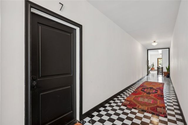 a view of a hallway view with staircase