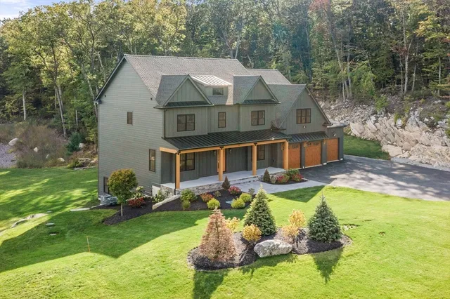 a kitchen with stainless steel appliances a refrigerator and cabinets