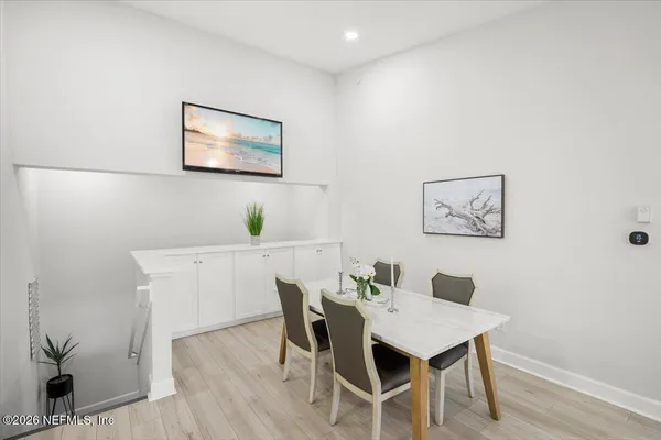 a view of a dining room with furniture