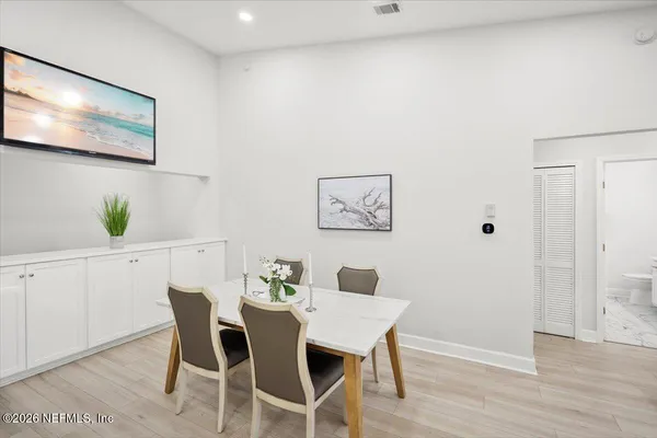 a view of a dining room with furniture