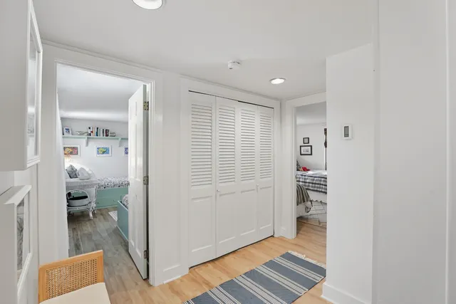 a bedroom with a bed and a cabinets