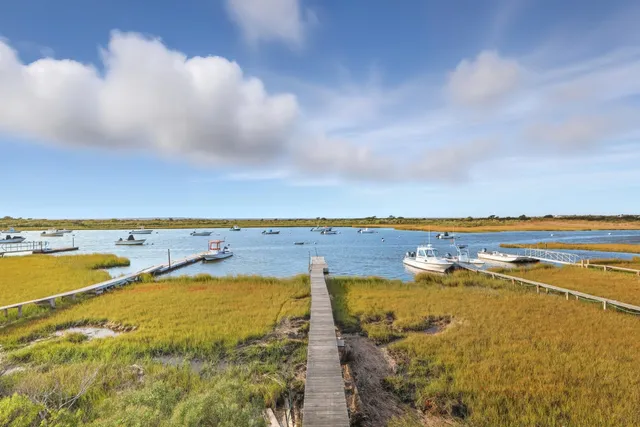 a view of wooden floor with a lake
