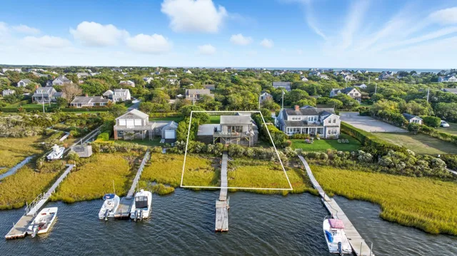 a view of an ocean and a building