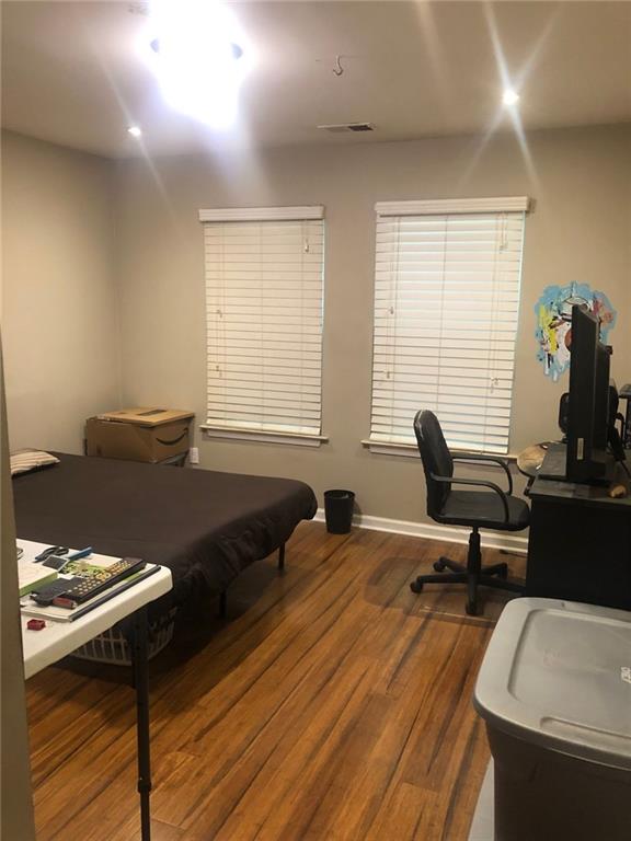 4064 Blanton Avenue Southwest Atlanta, GA 30331 - Photo 9 of 9 a view of a workspace with furniture and a window