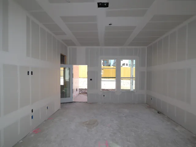 an empty room with windows
