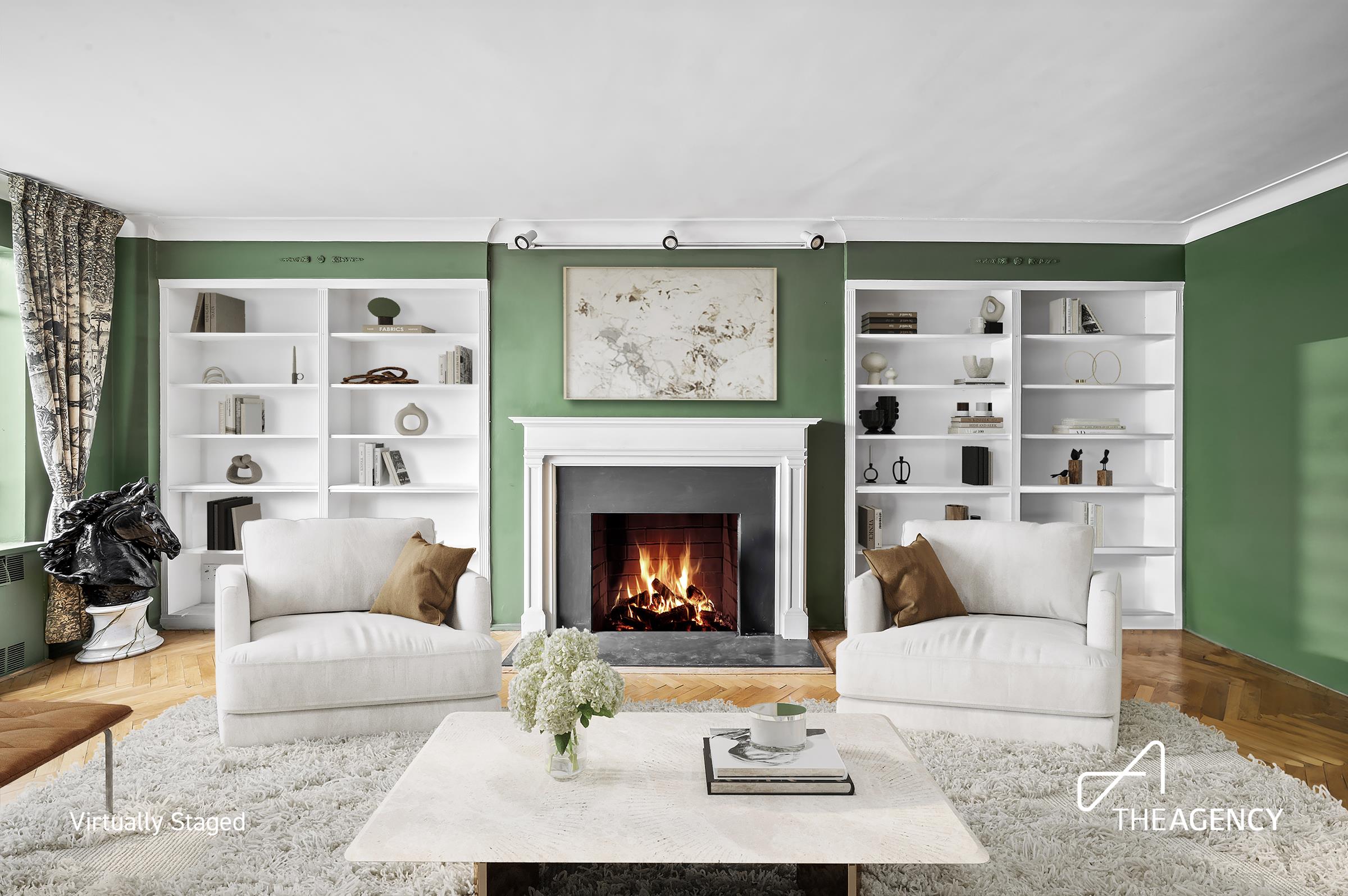 3 East 71st Street, Unit 2E Manhattan, NY 10021 - Photo 1 of 10 a living room with furniture and a fireplace