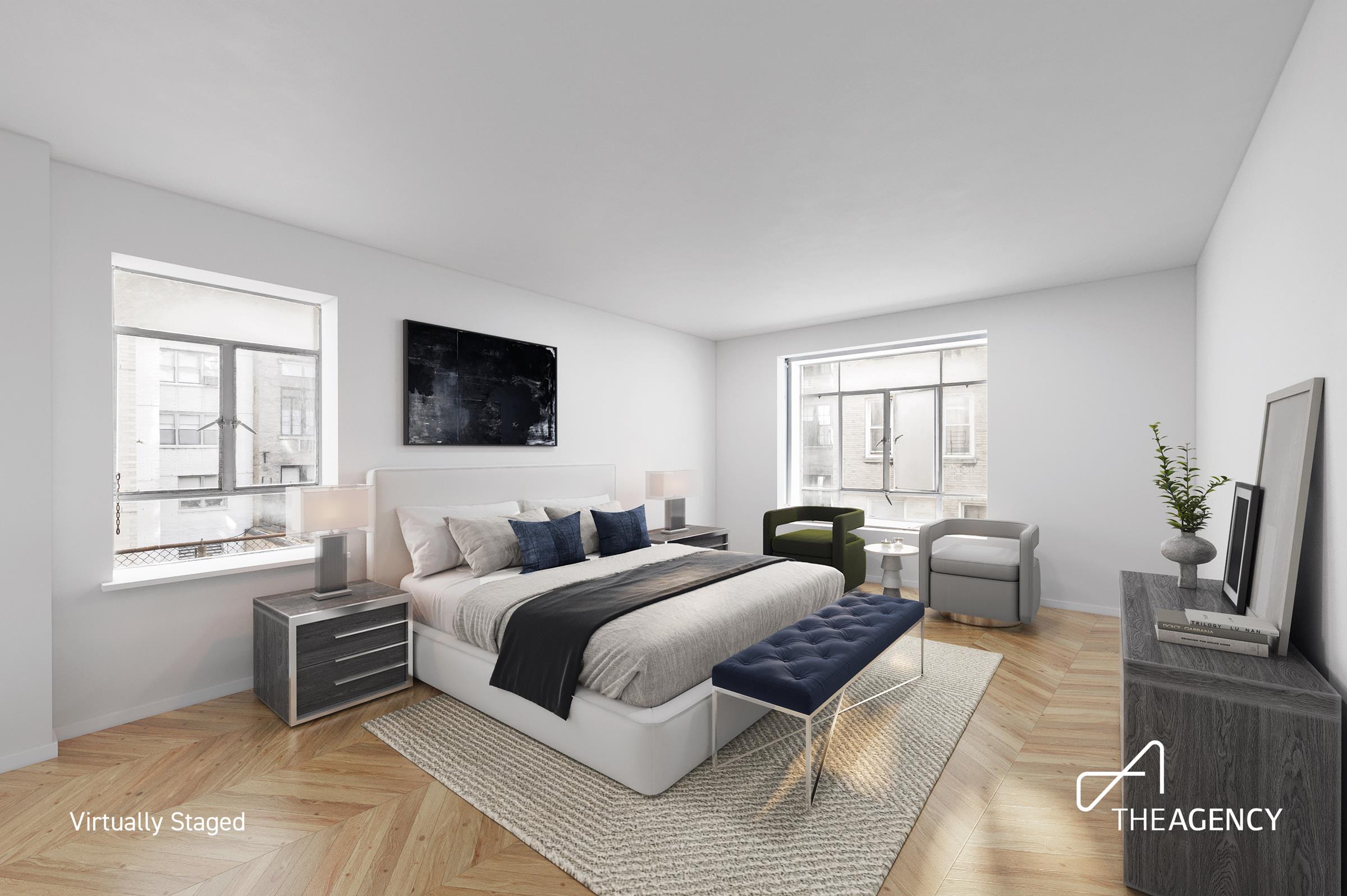 3 East 71st Street, Unit 2E Manhattan, NY 10021 - Photo 8 of 10 a bedroom with a bed and a couch