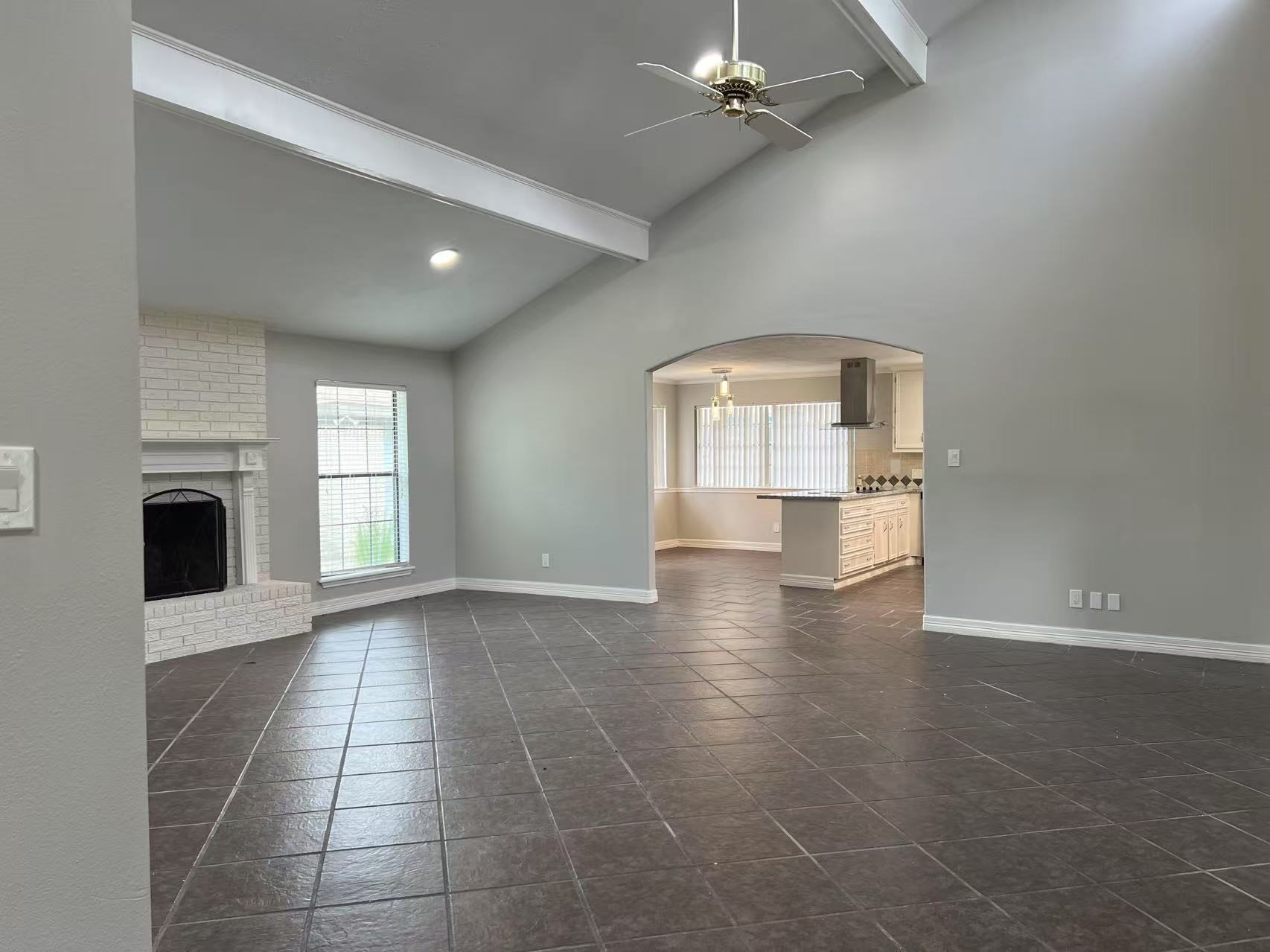 14221 Horseshoe Bend Conroe, TX 77384 - Photo 12 of 21 an empty room with windows and fireplace