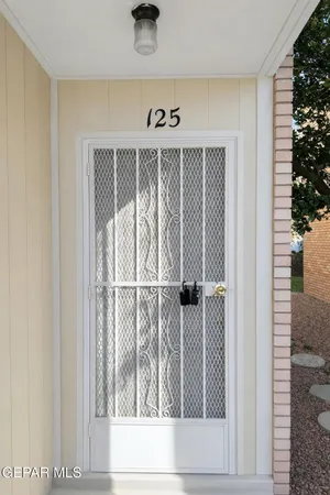 a view of a door and a window