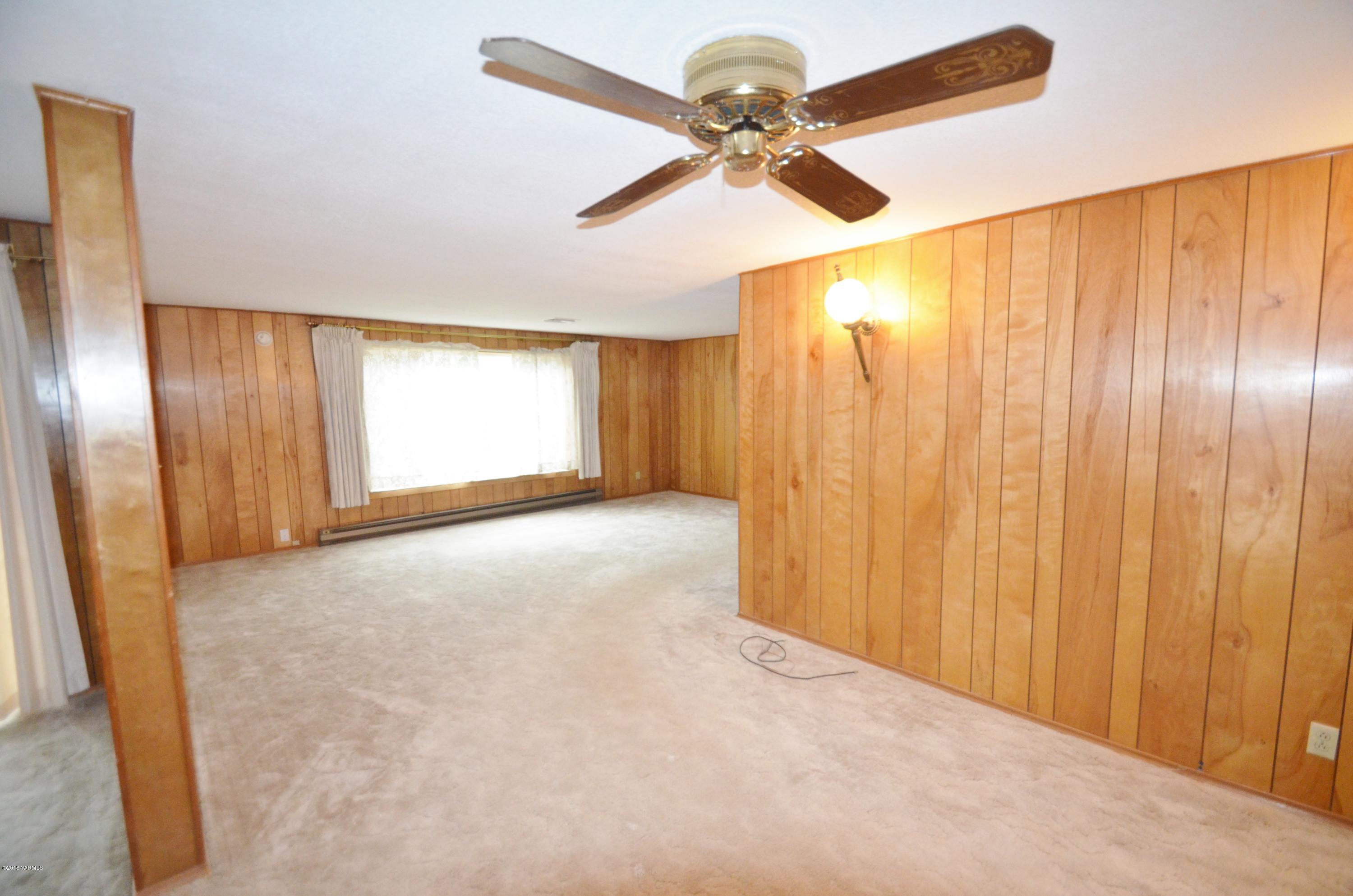 1817 Riverside Road Yakima, WA 98901 - Photo 22 of 31 a view of an empty room and a window