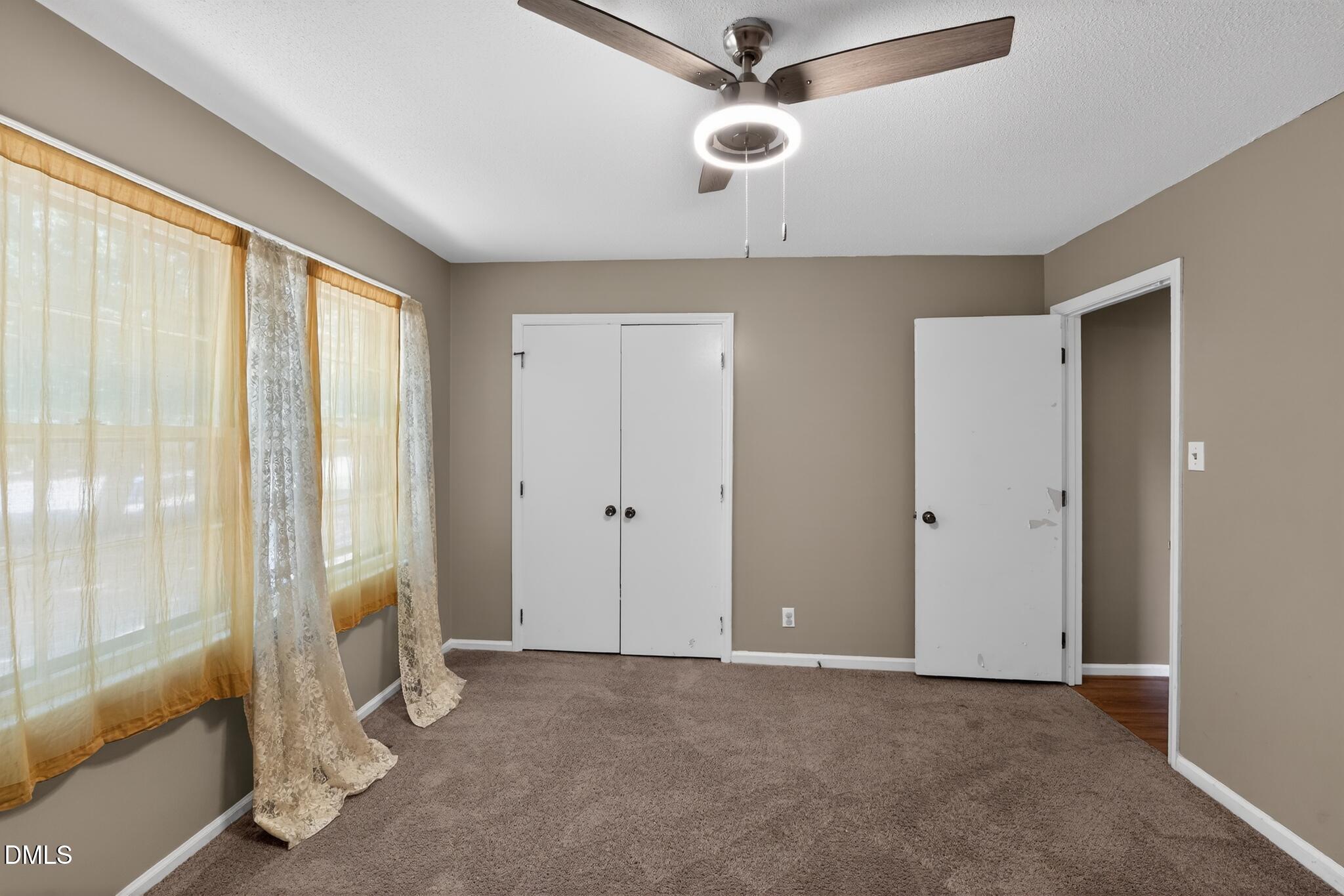 1034 Jerome Road Durham, NC 27713 - Photo 23 of 35 a view of an empty room with a window