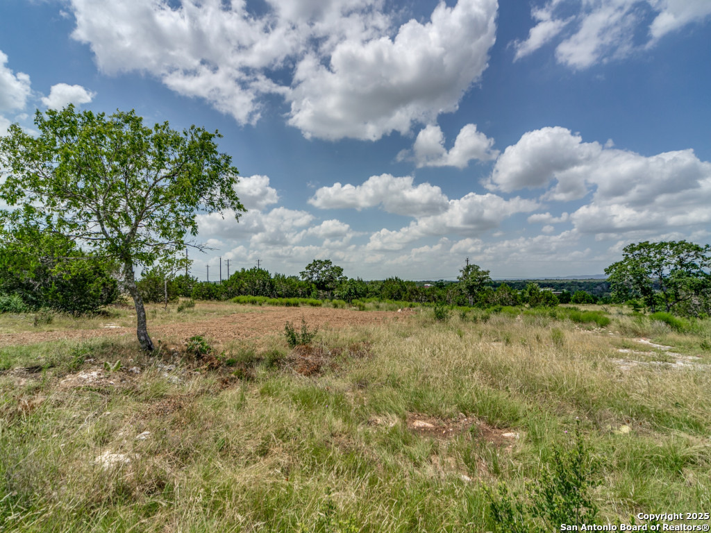 Lot 38 Sabinas Creek Ranch Boerne, TX 78006 - Photo 5 of 13 a view of lake with houses in back