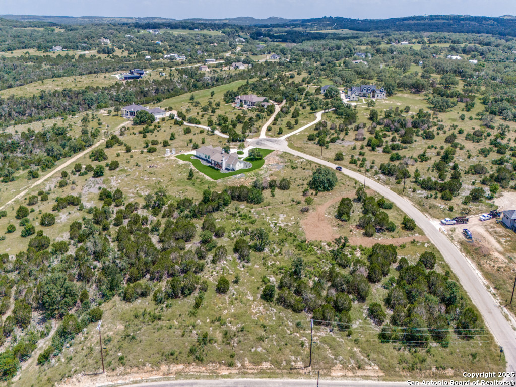 Lot 38 Sabinas Creek Ranch Boerne, TX 78006 - Photo 8 of 13 an aerial view of residential houses with outdoor space