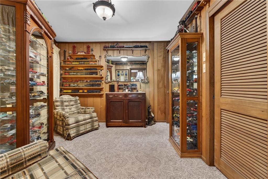 149 Pine Bluff Trail Jackson, GA 30233 - Photo 47 of 59 a view of walk in closet with clothes