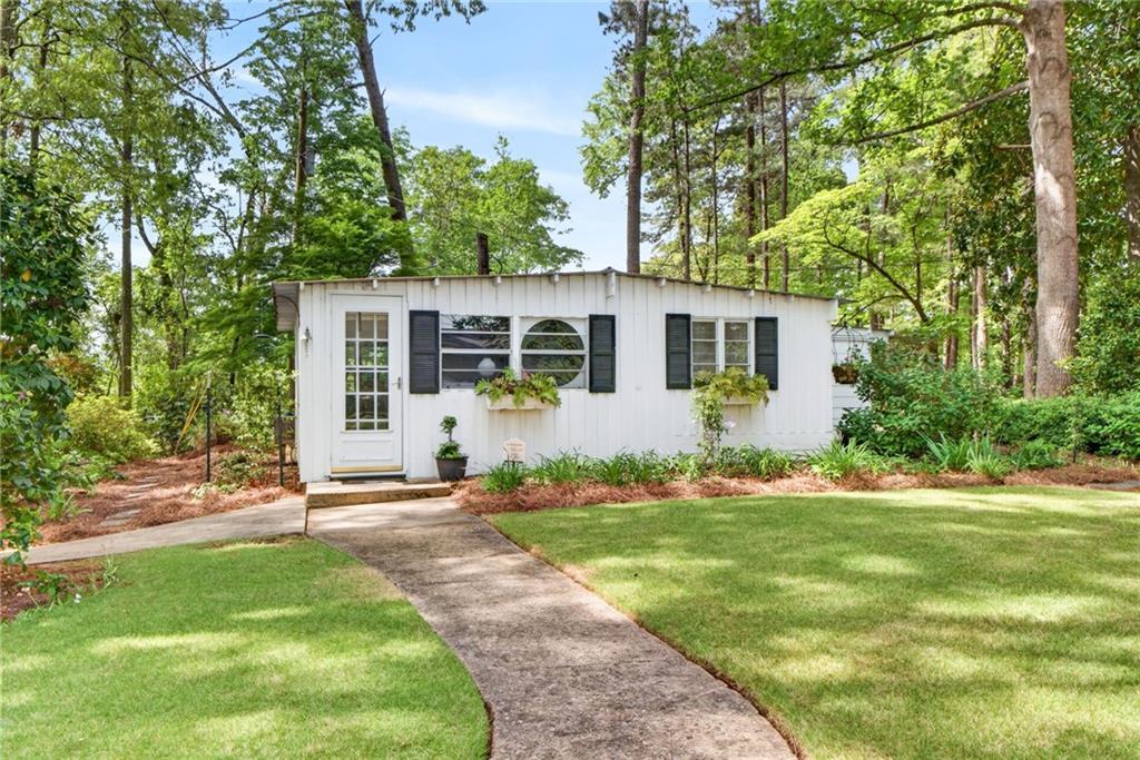 149 Pine Bluff Trail Jackson, GA 30233 - Photo 50 of 59 a front view of a house with a yard